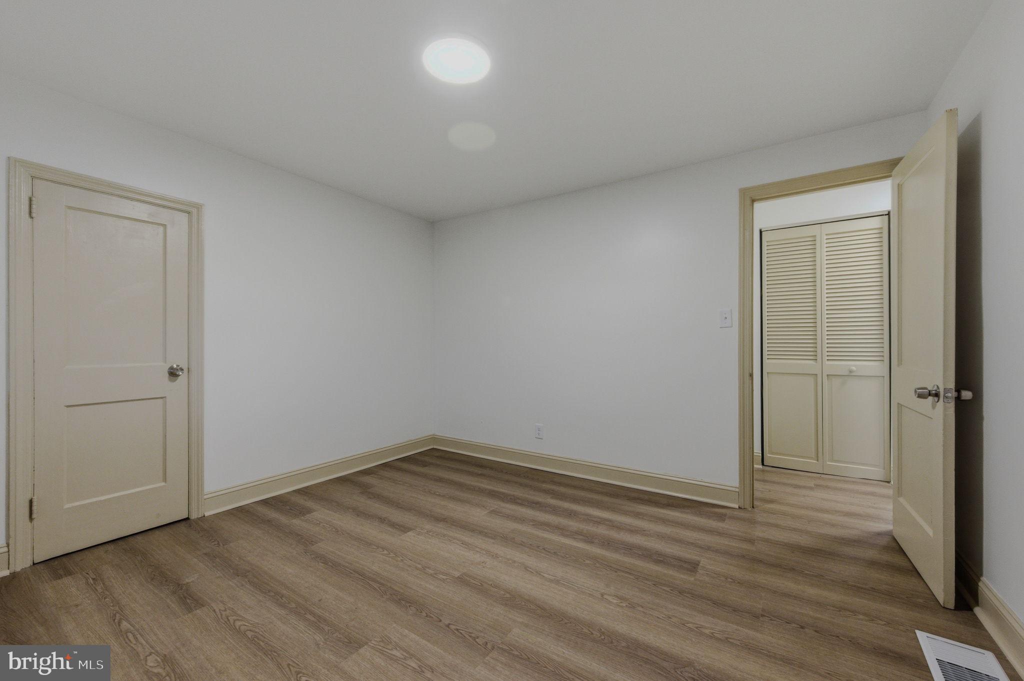 208 Harding Avenue Wilmington, DE 19804 - Photo 13 of 28 wooden floor in an empty room