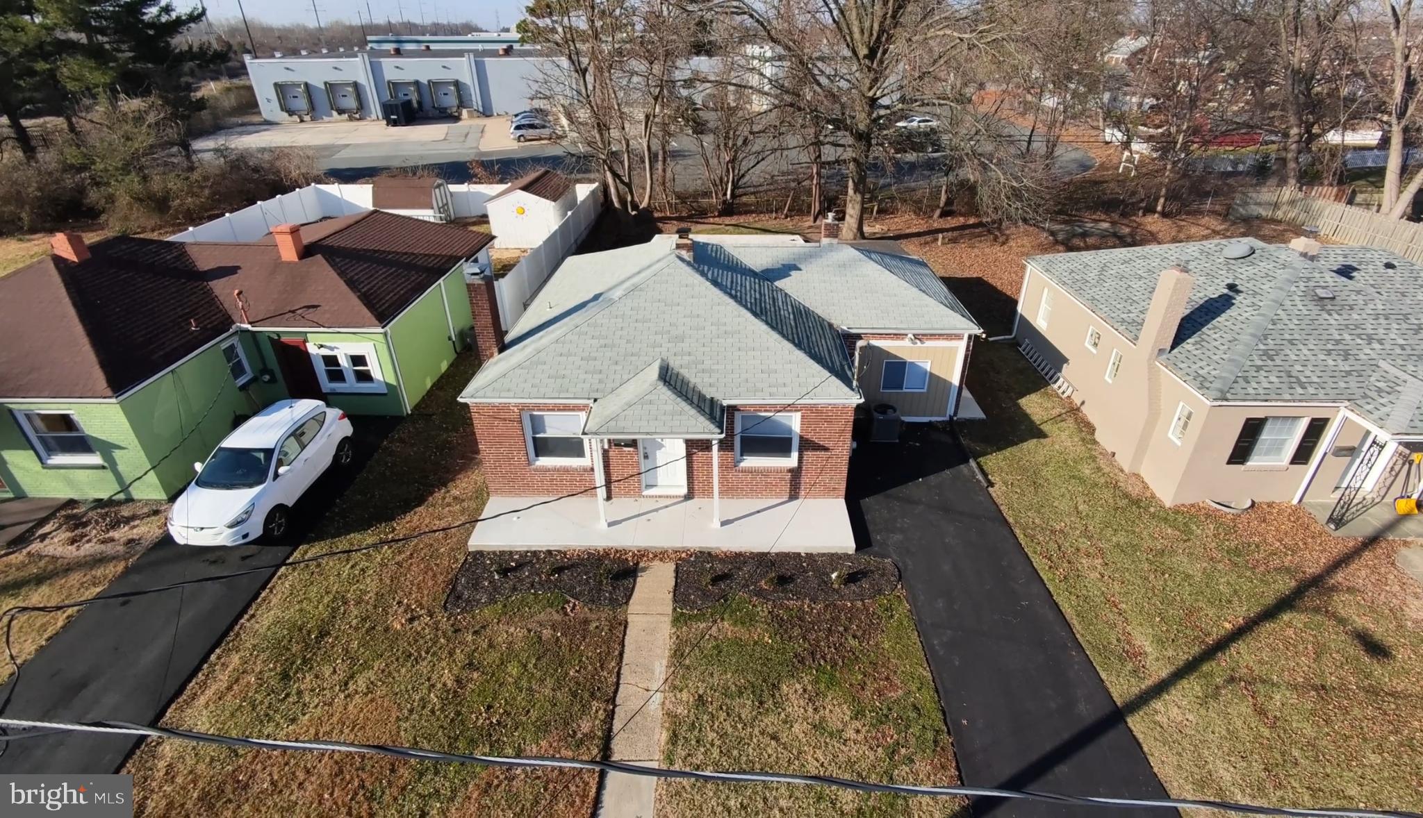208 Harding Avenue Wilmington, DE 19804 - Photo 2 of 28 an aerial view of a house with large trees