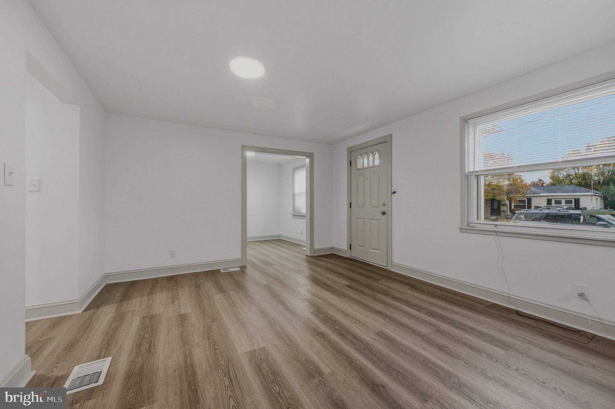 208 Harding Avenue Wilmington, DE 19804 - Photo 7 of 28 a view of room with window and wooden floor