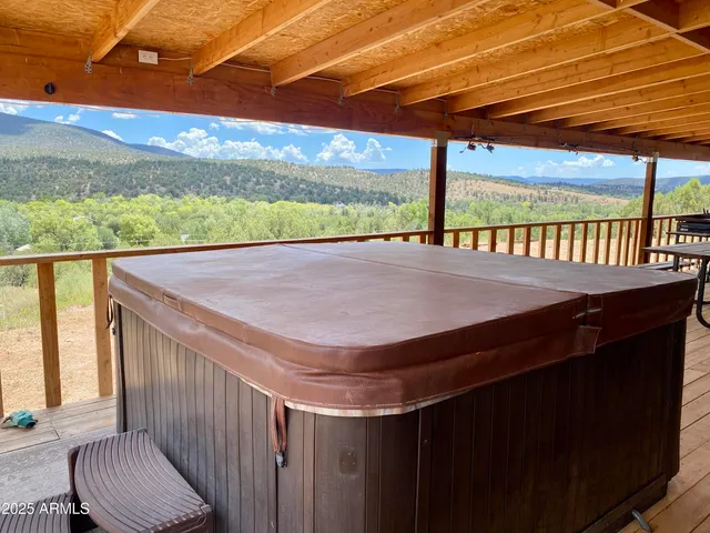 a view of balcony with furniture