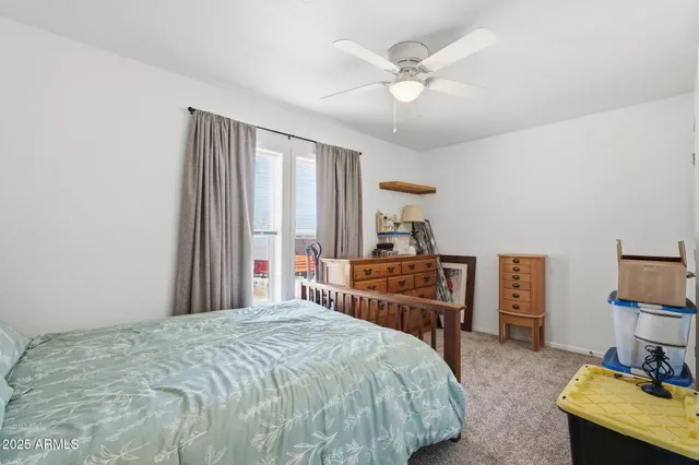 a bathroom with a shower sink and mirror