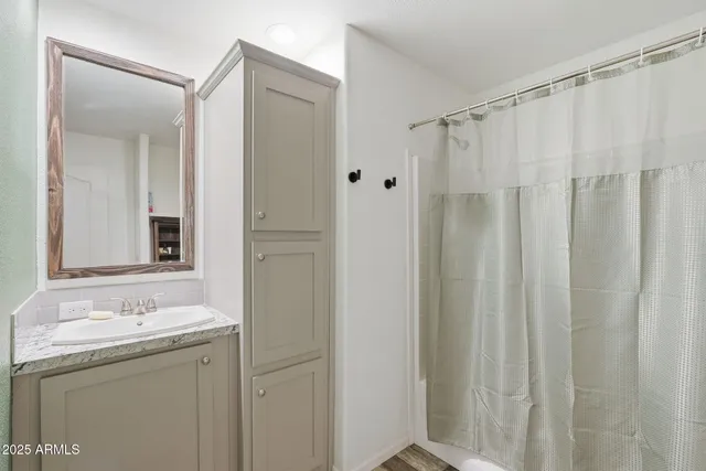 a bathroom with a toilet and a fireplace