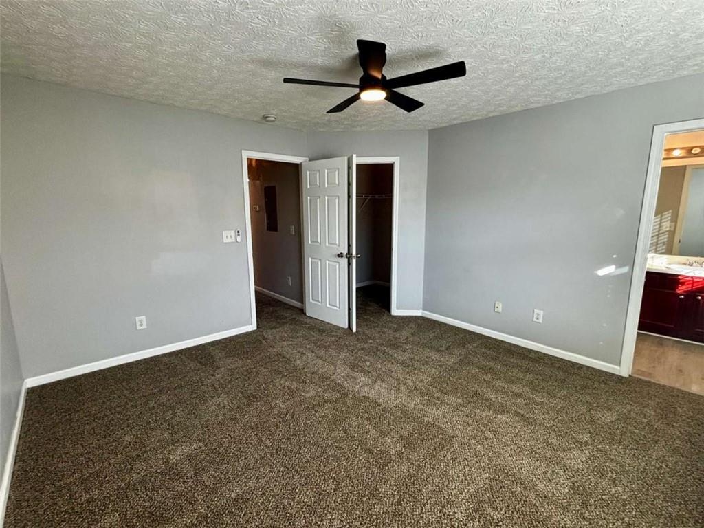4249 High Park Lane East Point, GA 30344 - Photo 14 of 27 a view of a livingroom with a ceiling fan