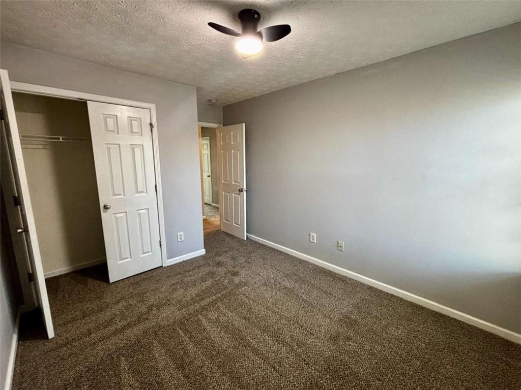 4249 High Park Lane East Point, GA 30344 - Photo 19 of 27 an empty room with closet area
