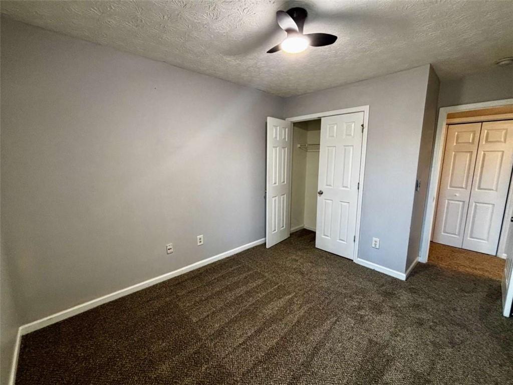 4249 High Park Lane East Point, GA 30344 - Photo 20 of 27 an empty room with a empty space and windows