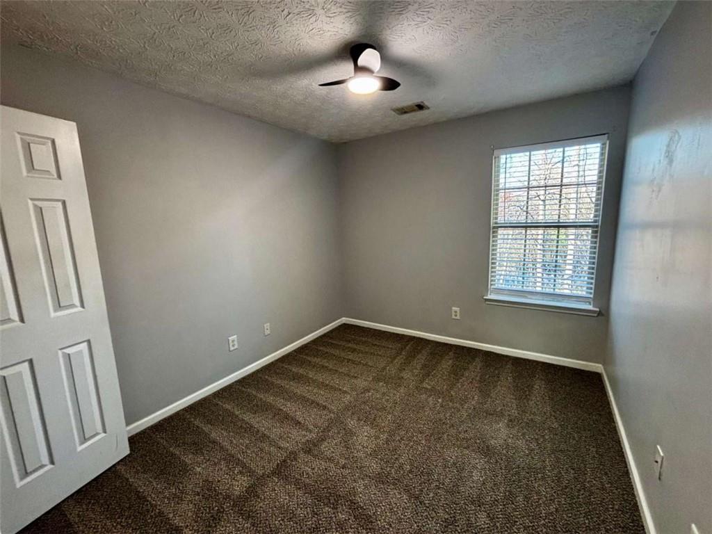 4249 High Park Lane East Point, GA 30344 - Photo 21 of 27 a view of an empty room and window