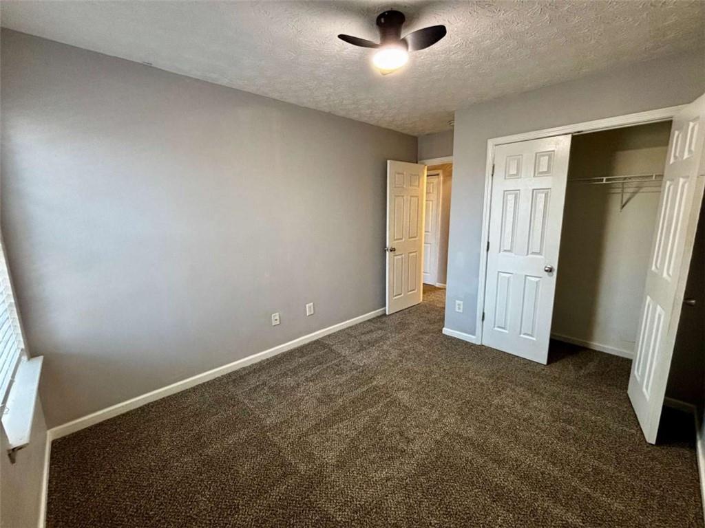 4249 High Park Lane East Point, GA 30344 - Photo 22 of 27 an empty room with windows