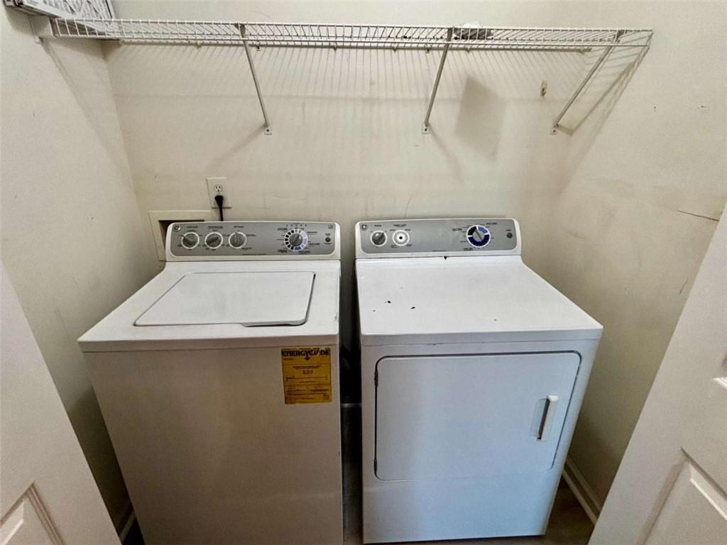4249 High Park Lane East Point, GA 30344 - Photo 27 of 27 a utility room with dryer and washer
