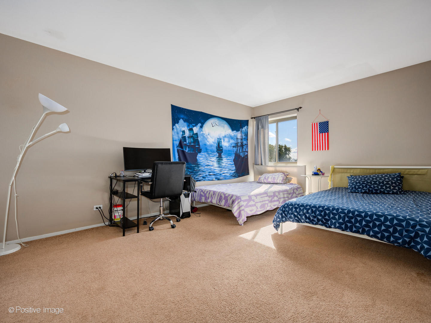 1931 Prairie Square, Unit 311 Schaumburg, IL 60173 - Photo 11 of 20 a bedroom with furniture and a bed