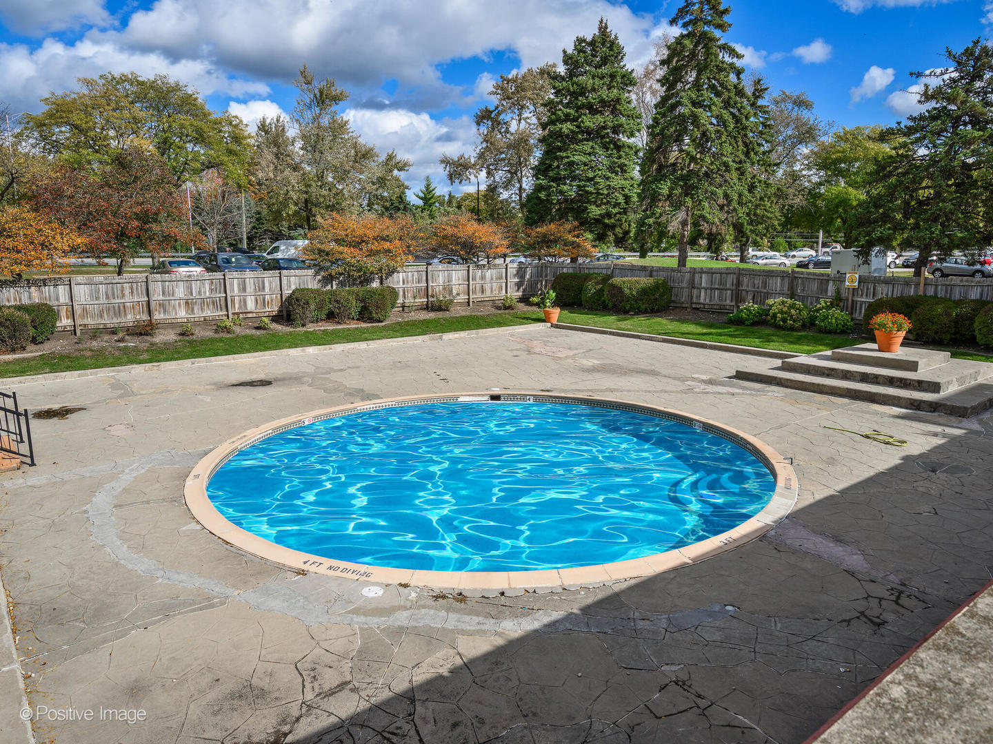 1931 Prairie Square, Unit 311 Schaumburg, IL 60173 - Photo 17 of 20 a view of a swimming pool with a yard