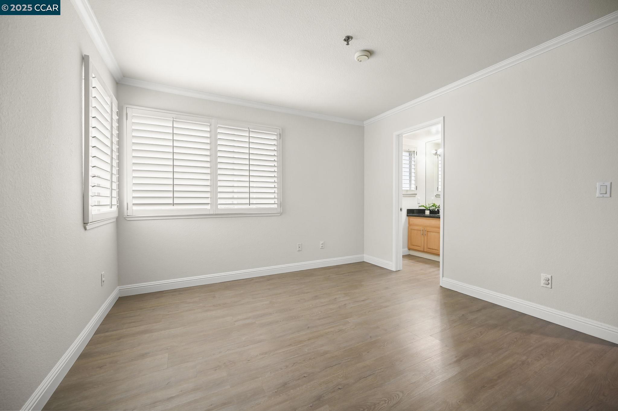2550 Oak Road, Unit 209 Walnut Creek, CA 94597 - Photo 17 of 34 a view of an empty room with a window