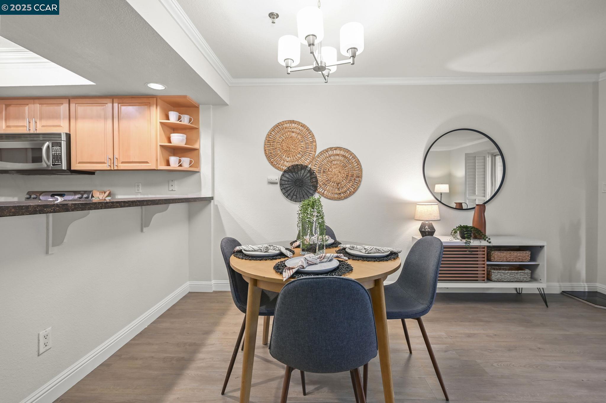 2550 Oak Road, Unit 209 Walnut Creek, CA 94597 - Photo 7 of 34 a view of a dining room with furniture and a window