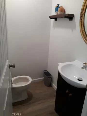 a bathroom with a toilet and a sink