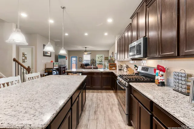 a kitchen with granite countertop lots of counter top space