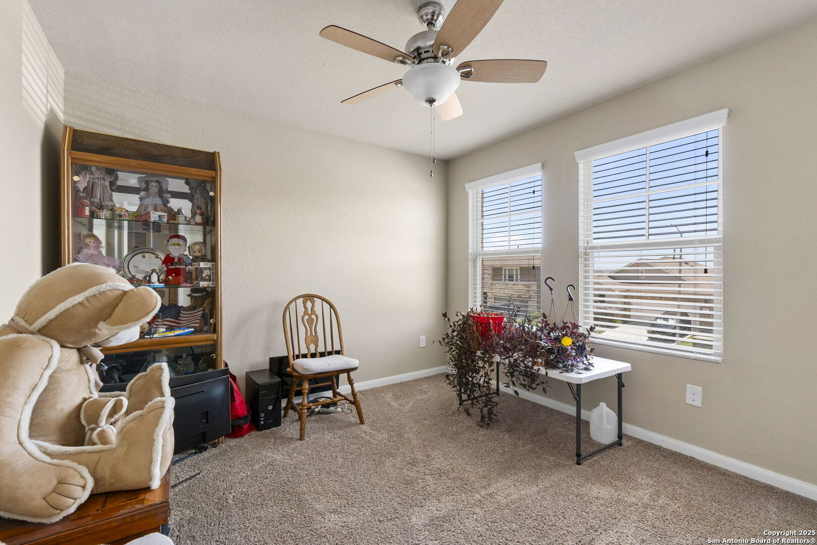 10343 Rosalina Loop Converse, TX 78109 - Photo 27 of 38 a room with furniture and windows