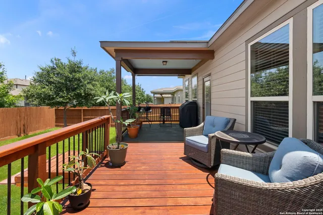 a outdoor space with patio the couches and a potted plant