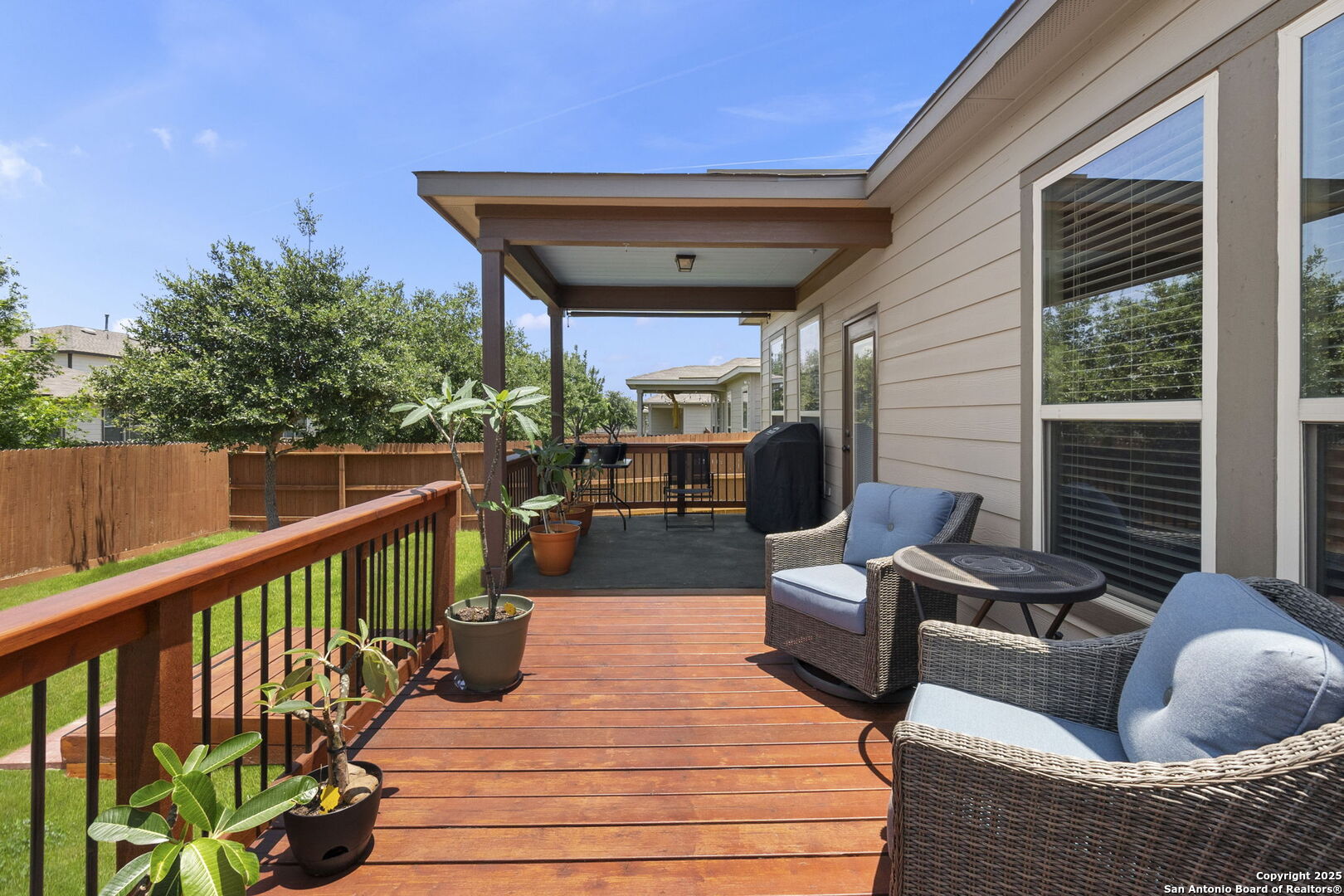 10343 Rosalina Loop Converse, TX 78109 - Photo 32 of 38 a outdoor space with patio the couches and a potted plant