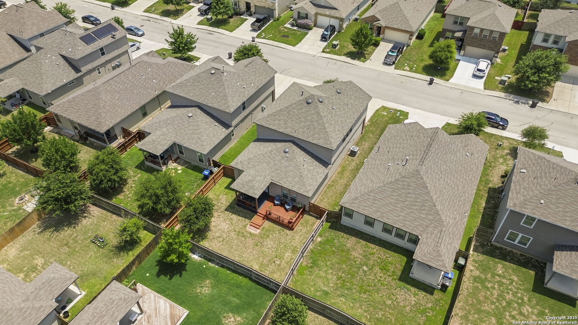 10343 Rosalina Loop Converse, TX 78109 - Photo 33 of 38 an aerial view of a house with a garden and trees
