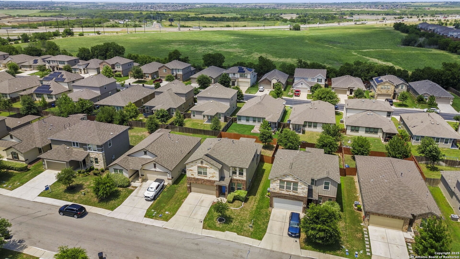 10343 Rosalina Loop Converse, TX 78109 - Photo 35 of 38 an aerial view of a houses with outdoor space and city view