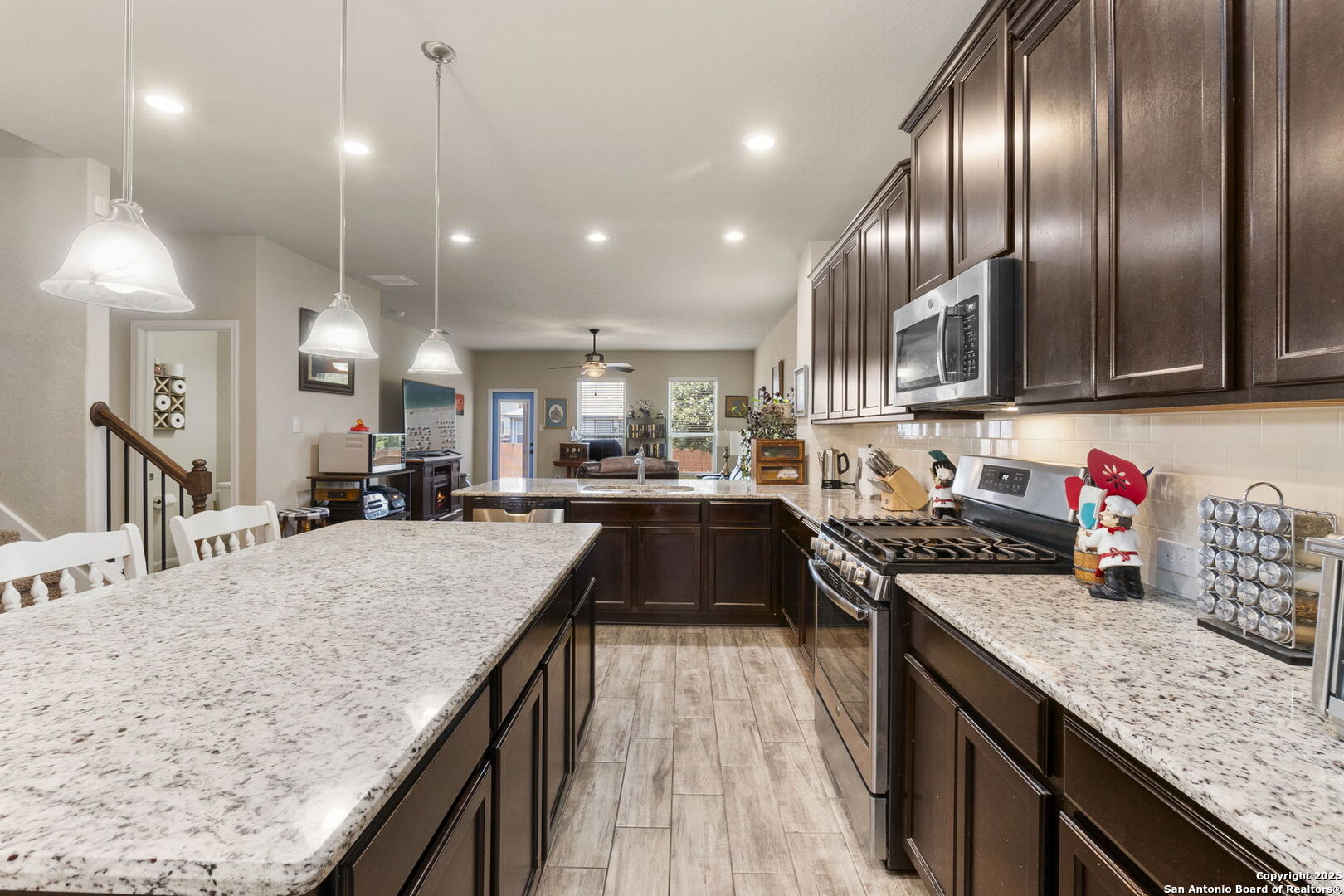 10343 Rosalina Loop Converse, TX 78109 - Photo 6 of 38 a kitchen with granite countertop lots of counter top space