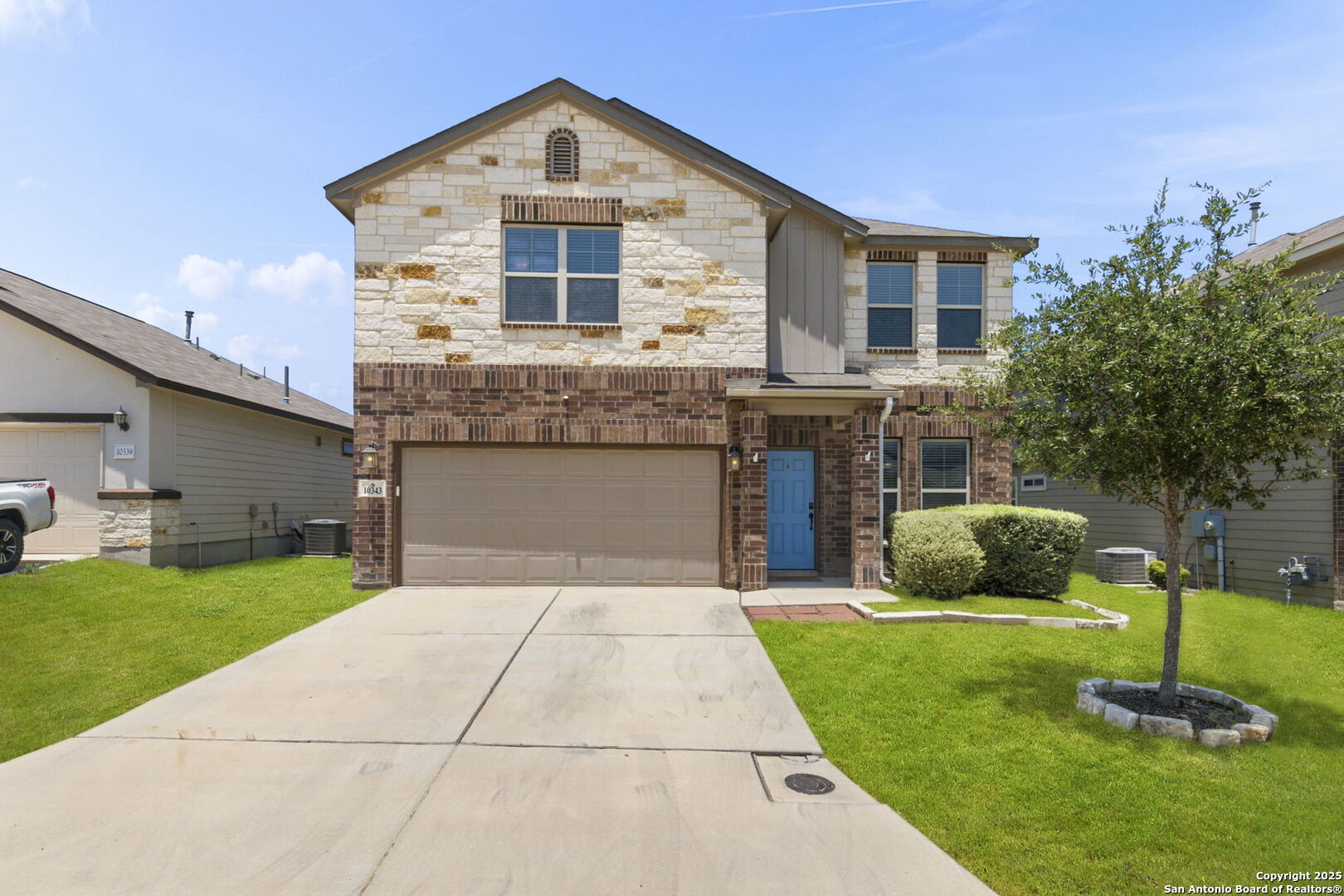 10343 Rosalina Loop Converse, TX 78109 - Photo 9 of 38 a front view of a house with a yard
