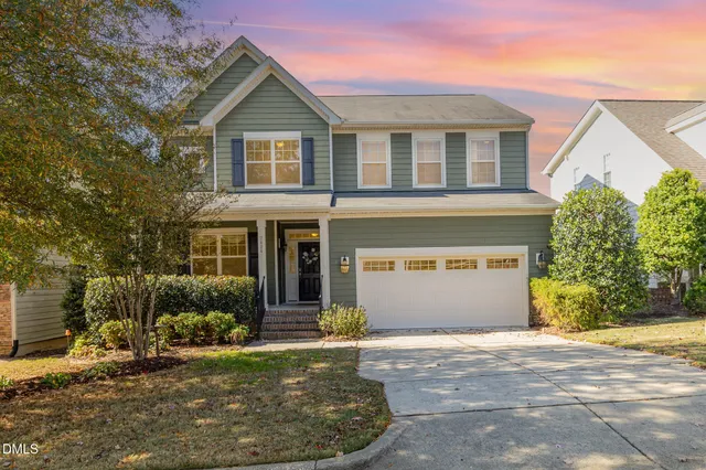 a black and white photo of a living room