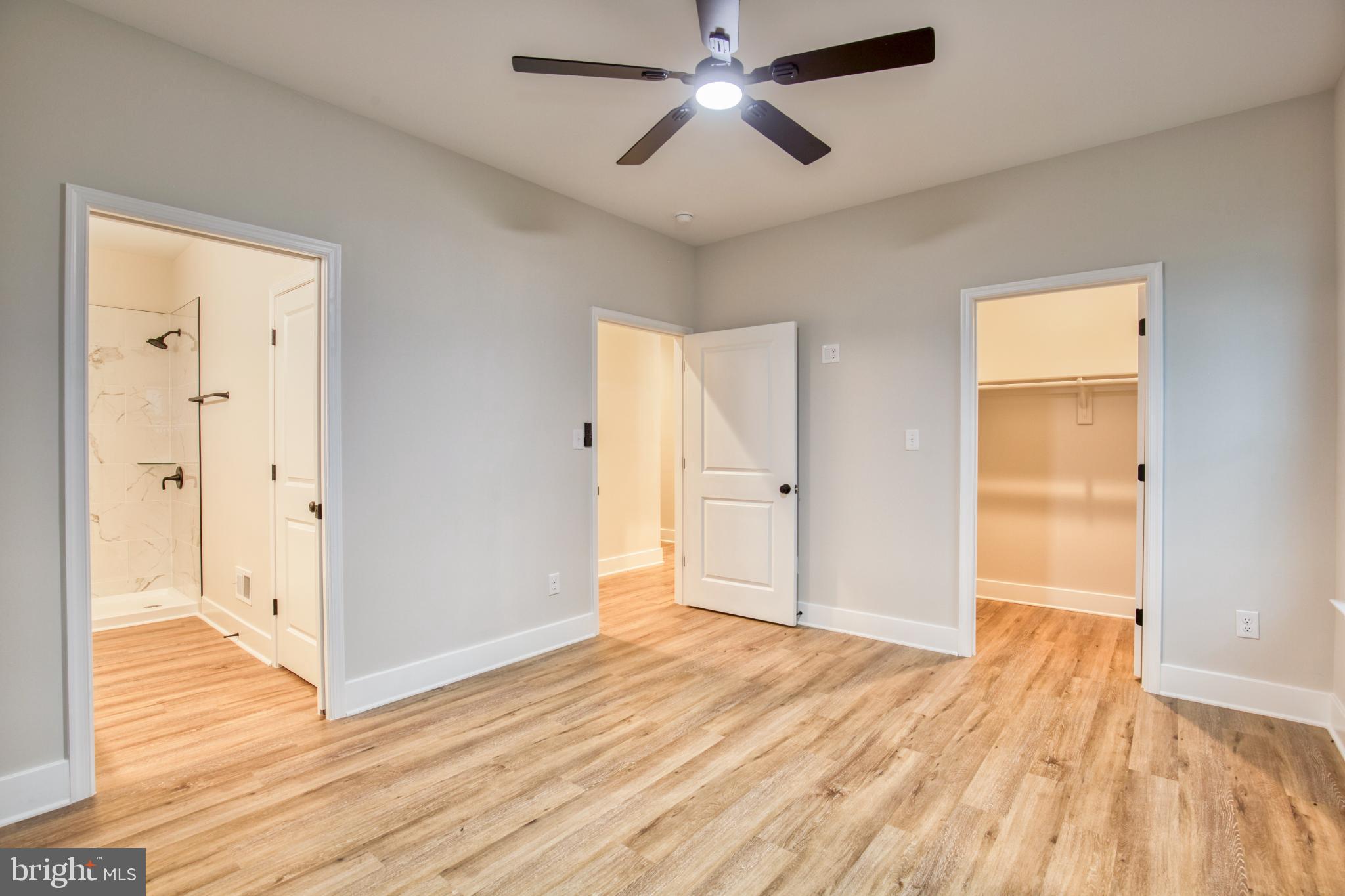 0 Beacon Court Montross, VA 22520 - Photo 12 of 19 a view of empty room with wooden floor