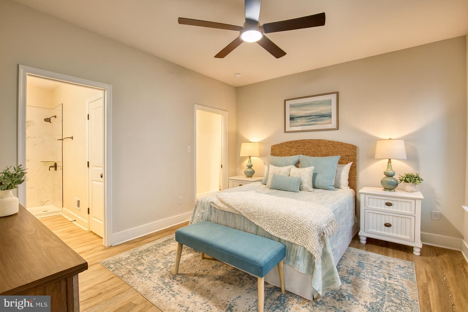 0 Beacon Court Montross, VA 22520 - Photo 5 of 19 a bedroom with a bed and a chandelier