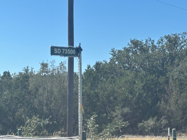 0 SD 73510 Rocksprings, TX 78880 - Photo 3 of 32 a sign board with tall trees