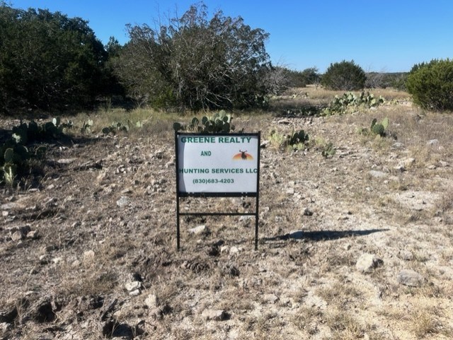 0 SD 73510 Rocksprings, TX 78880 - Photo 6 of 32 a sign board with view of lake