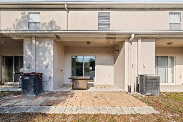 a view of a house with a patio
