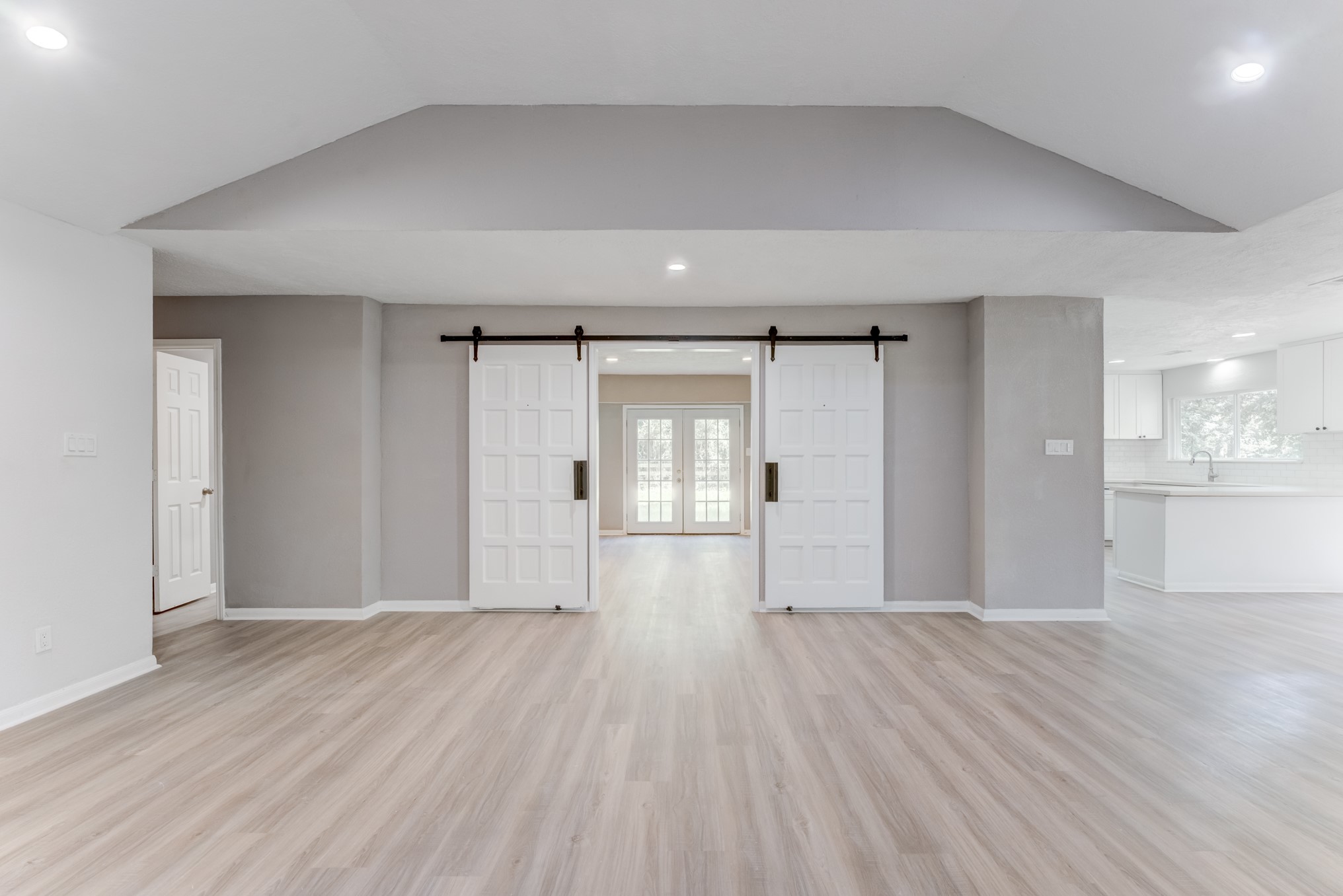 81 Oak Grove Lane Conroe, TX 77304 - Photo 11 of 50 a view of empty room with wooden floor
