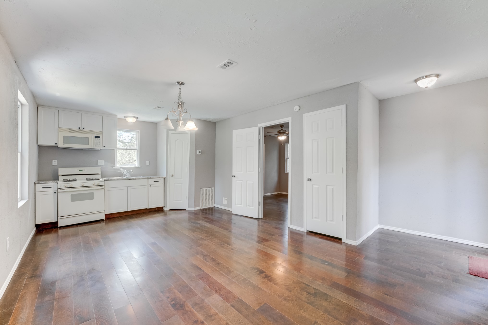 81 Oak Grove Lane Conroe, TX 77304 - Photo 37 of 50 a view of a kitchen with a sink and a stove top oven