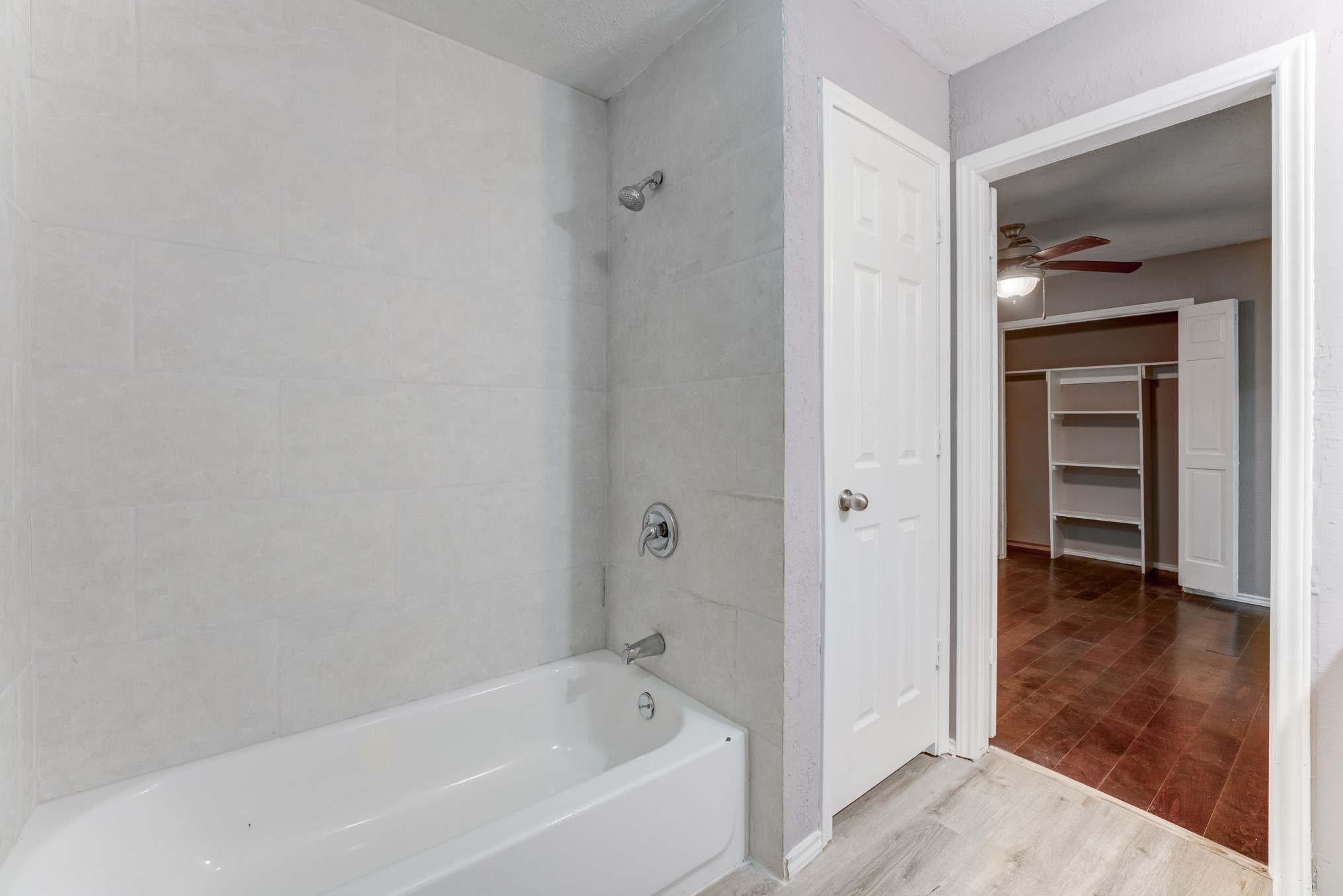 81 Oak Grove Lane Conroe, TX 77304 - Photo 40 of 50 a white bath tub sitting in a bathroom