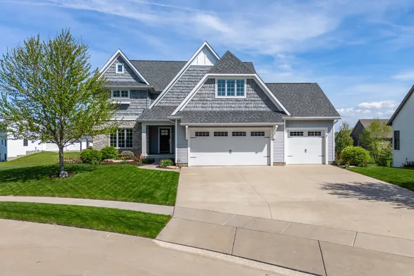 front view of a house with a yard