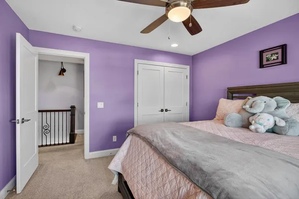 a living room with furniture pool and a flat screen tv