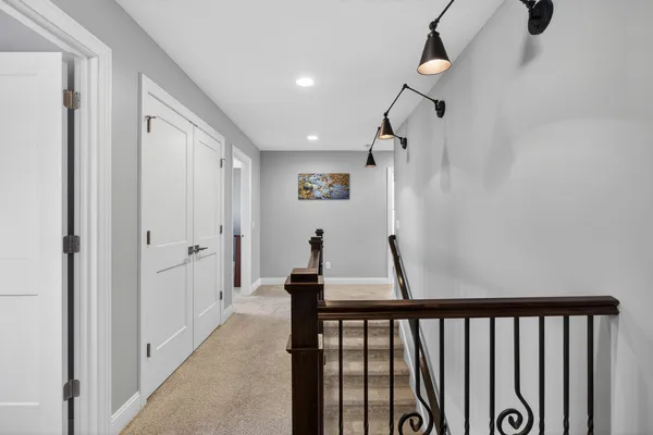 a room with furniture and pool table