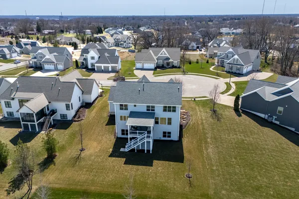 a view of a house with swimming pool