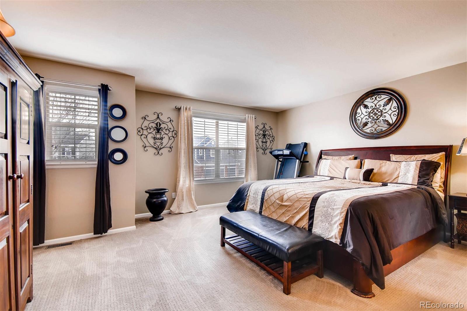 1665 Spring Water Lane Highlands Ranch, CO 80129 - Photo 19 of 34 a bedroom with bed and a window