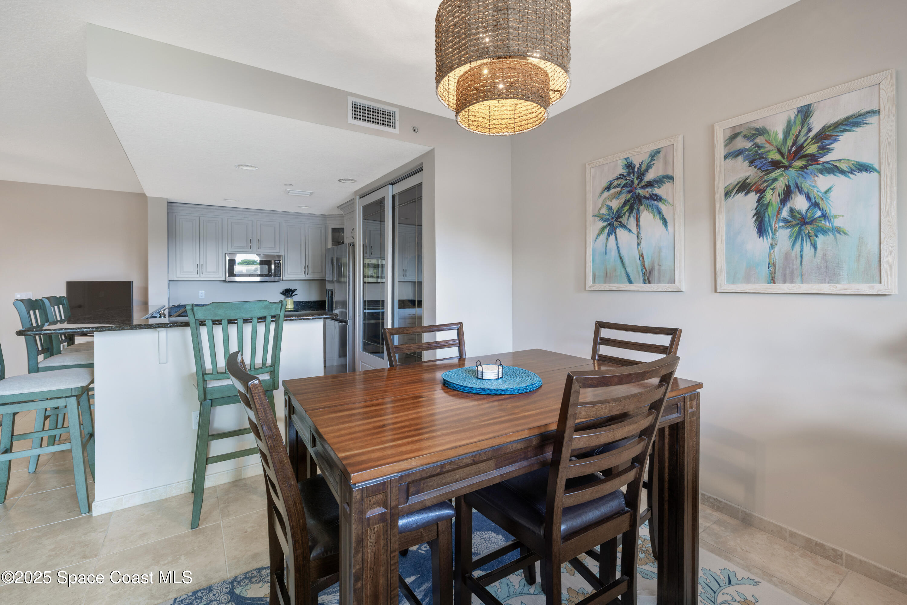 1623 Indian River Drive, Unit 103 Sebastian, FL 32958 - Photo 17 of 36 a view of a dining room with furniture