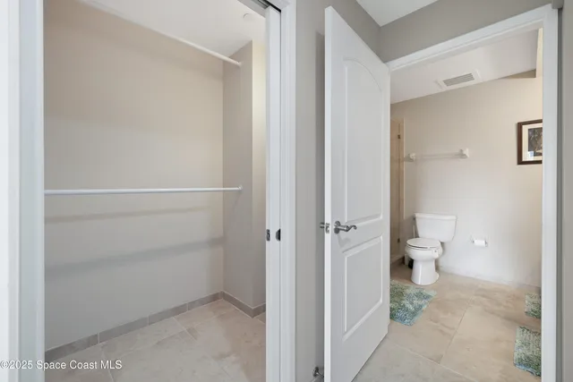 a bathroom with a sink double vanity and a mirror