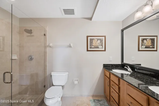 a view of a kitchen from the hallway