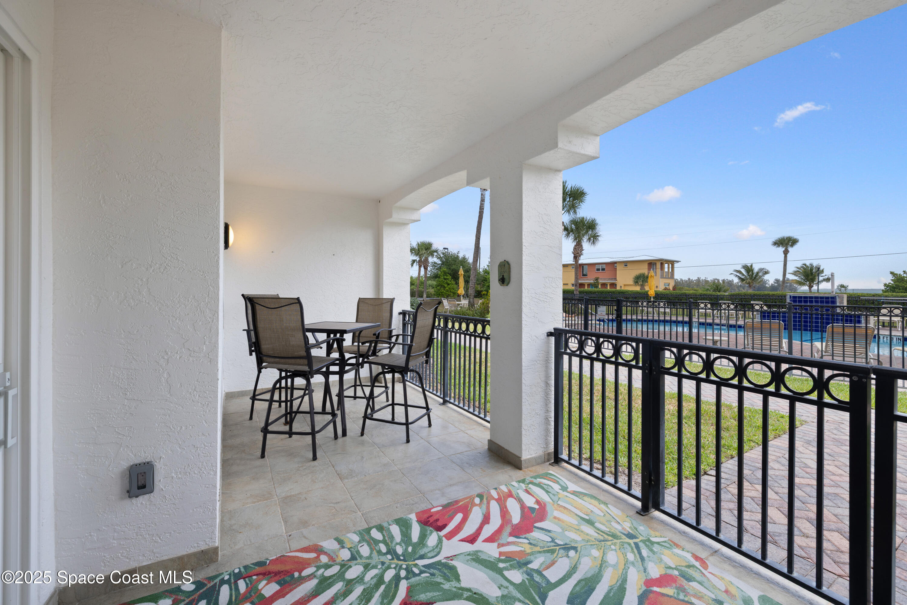 1623 Indian River Drive, Unit 103 Sebastian, FL 32958 - Photo 5 of 36 a view of a balcony with chairs