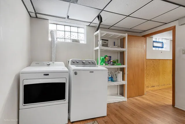 a utility room with dryer and washer