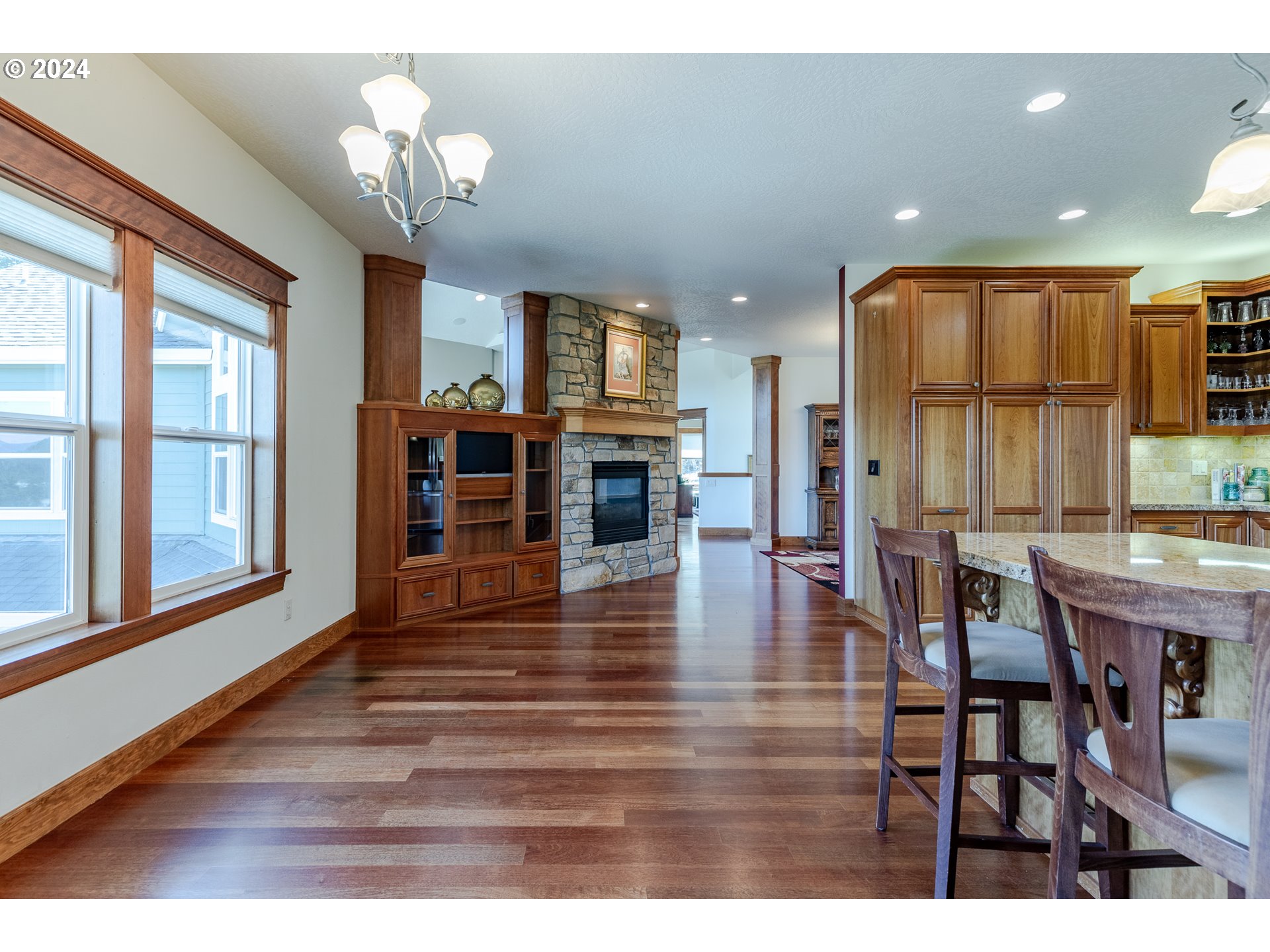 6188 Fernhill Loop Springfield, OR 97478 - Photo 11 of 40 a view of a dining room with furniture window and wooden floor