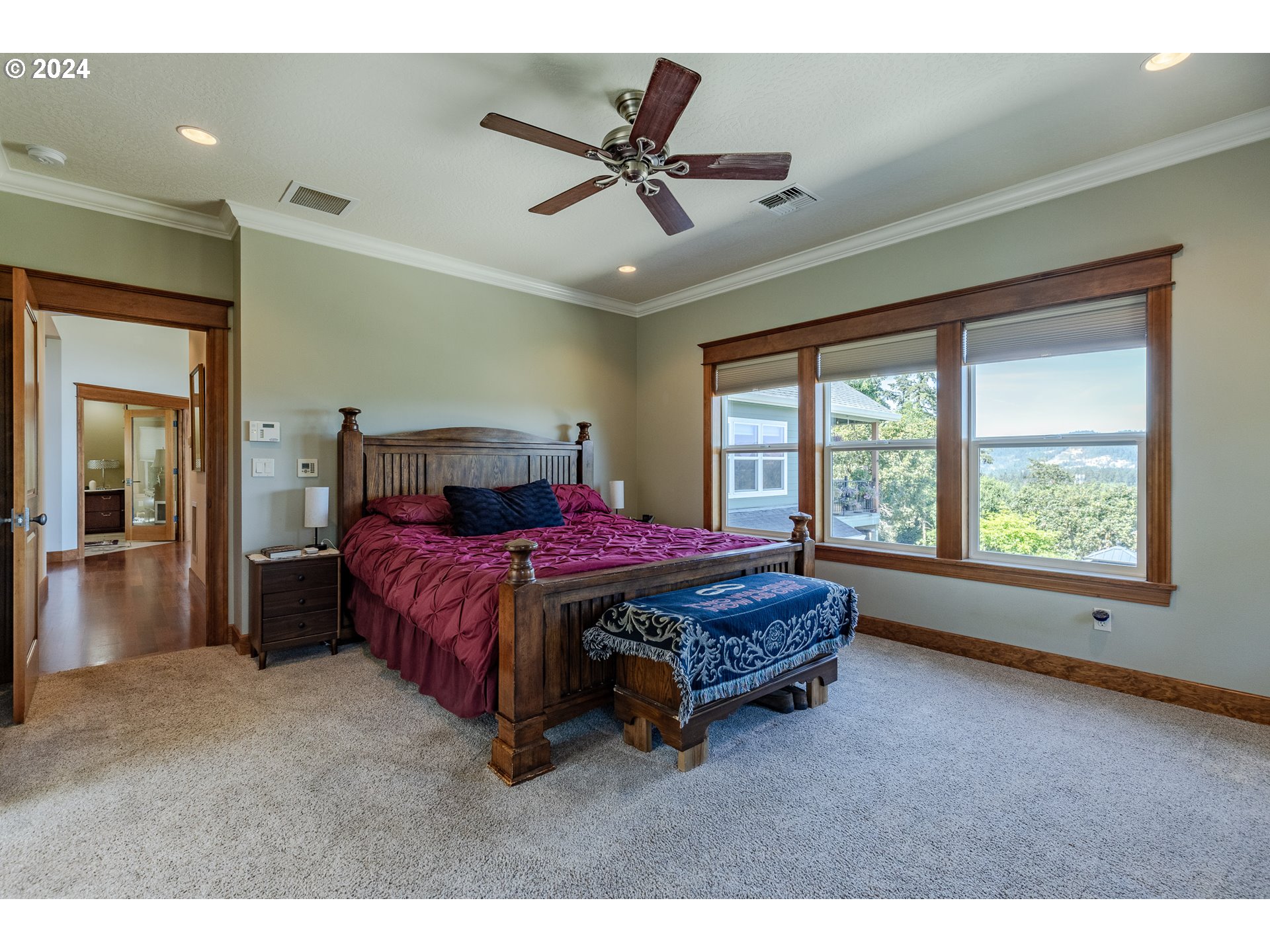 6188 Fernhill Loop Springfield, OR 97478 - Photo 16 of 40 a spacious bedroom with a bed and window