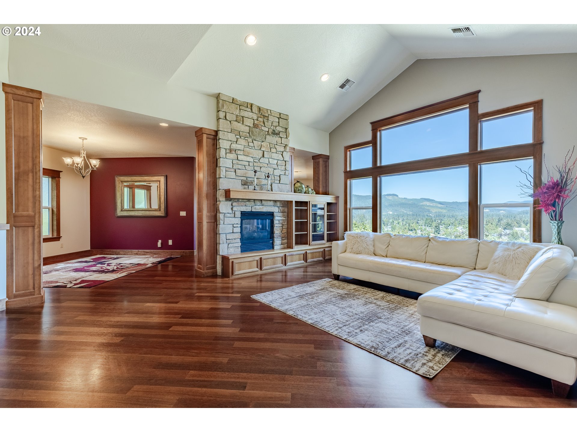 6188 Fernhill Loop Springfield, OR 97478 - Photo 7 of 40 a living room with furniture and a fireplace