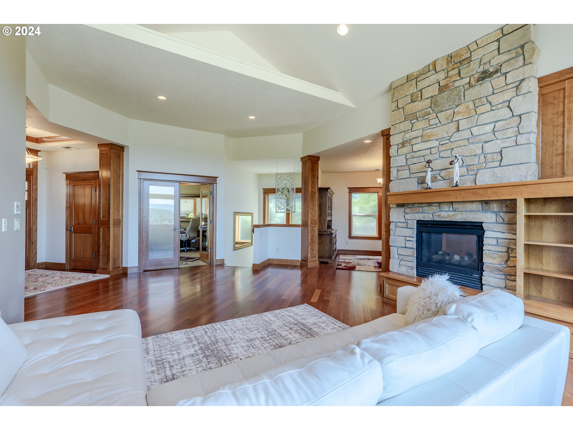 6188 Fernhill Loop Springfield, OR 97478 - Photo 8 of 40 a living room with furniture and a fireplace