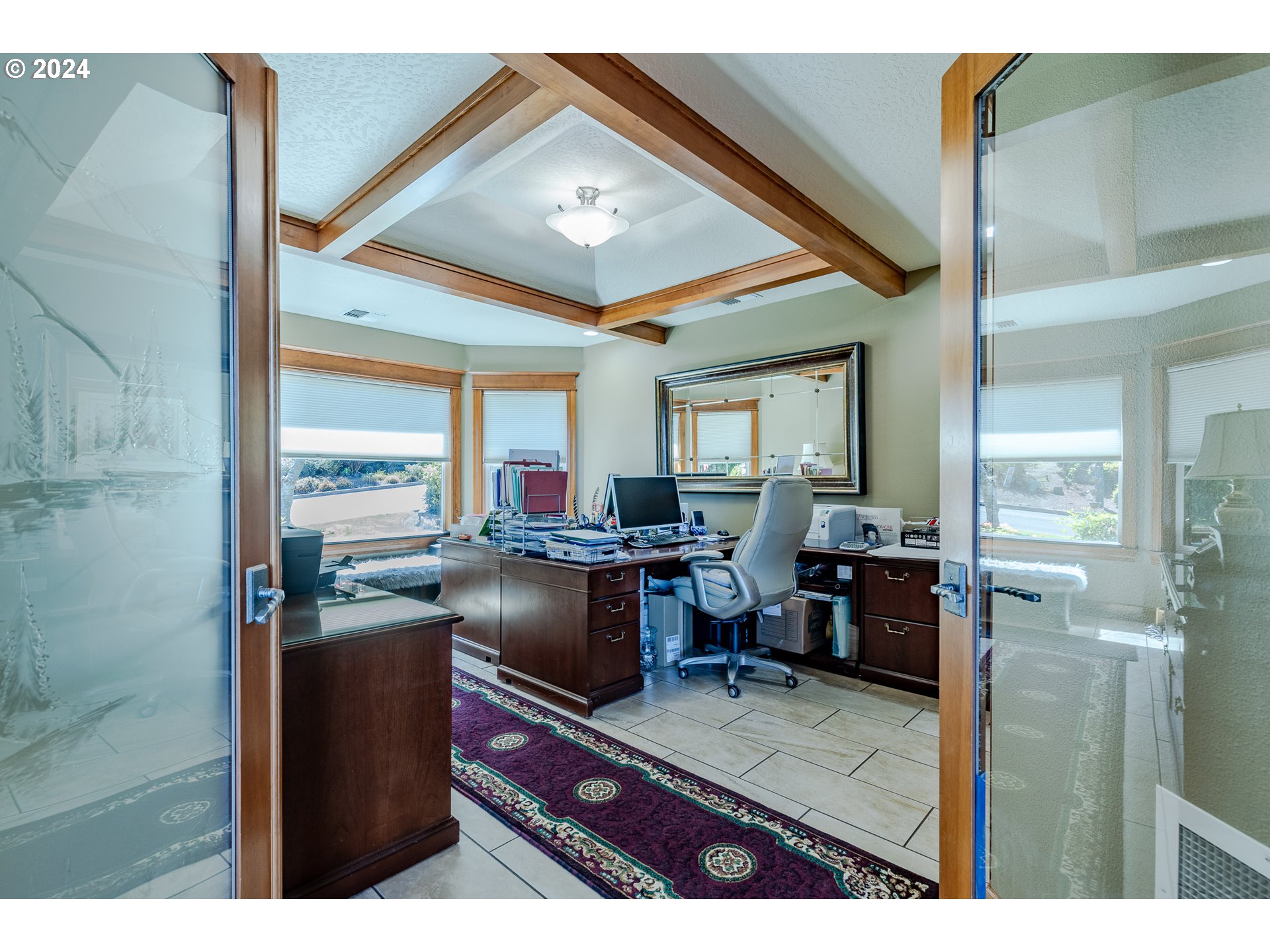 6188 Fernhill Loop Springfield, OR 97478 - Photo 9 of 40 a dining room with furniture and a kitchen view