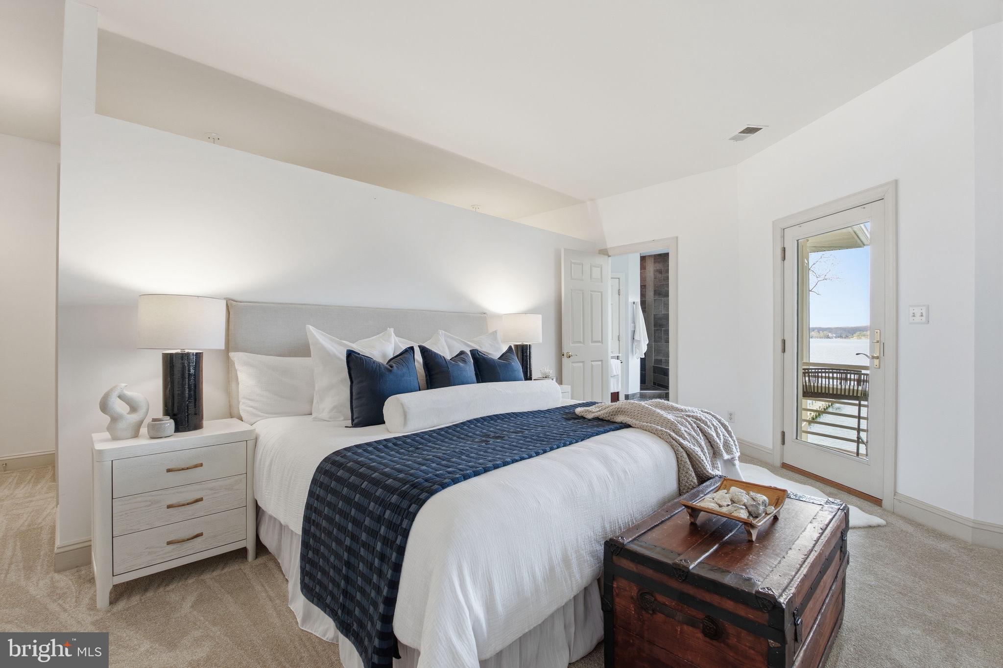 922 Old County Road Severna Park, MD 21146 - Photo 23 of 61 a bed room with bed and mirror